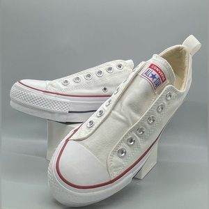 BRAND NEW!!! White platform converse, laces free. Size 7.